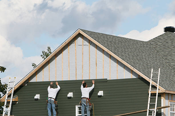 Professional Siding Installation technician working in Iron Station, NC
